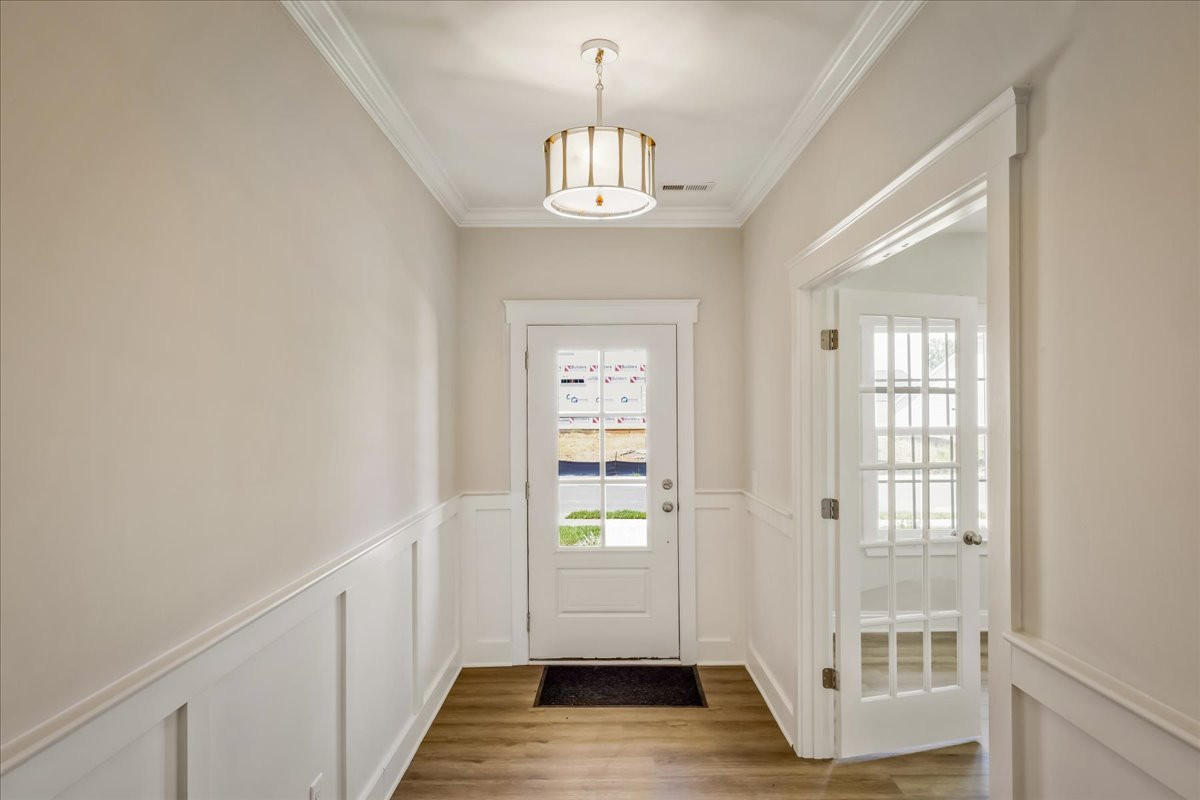 https://assets.windsorhomes.us/img/e_MG_lot51_Pembroke_elvB_1075_Fairhaven_Drive_exterior_foyer.jpg