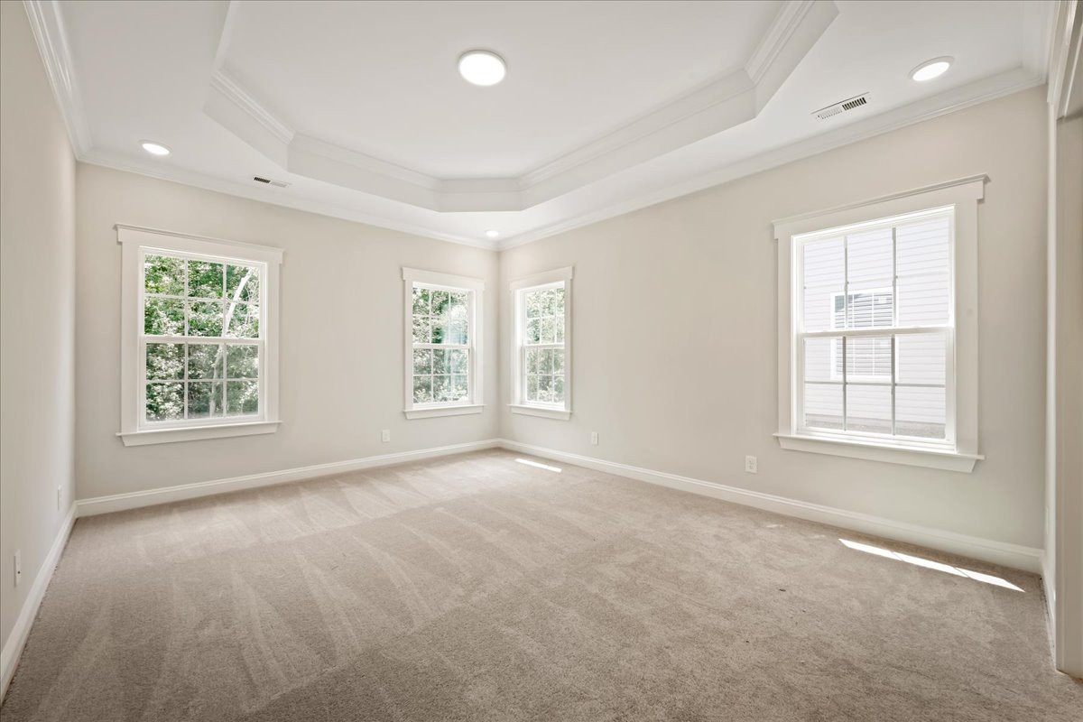 https://assets.windsorhomes.us/img/e_MG_lot51_Pembroke_elvB_1075_Fairhaven_Drive_exterior_primary_suite.jpg