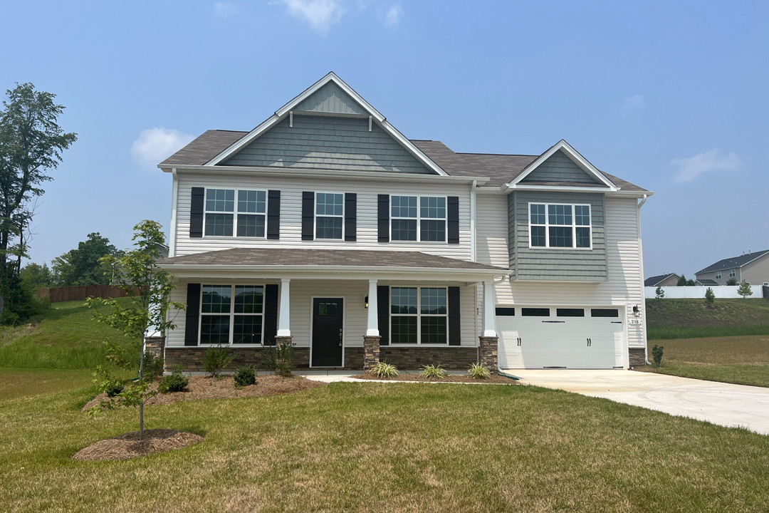 https://assets.windsorhomes.us/img/lewisville_F_LS_lot201_216-Mimosa-Drive-front.jpg